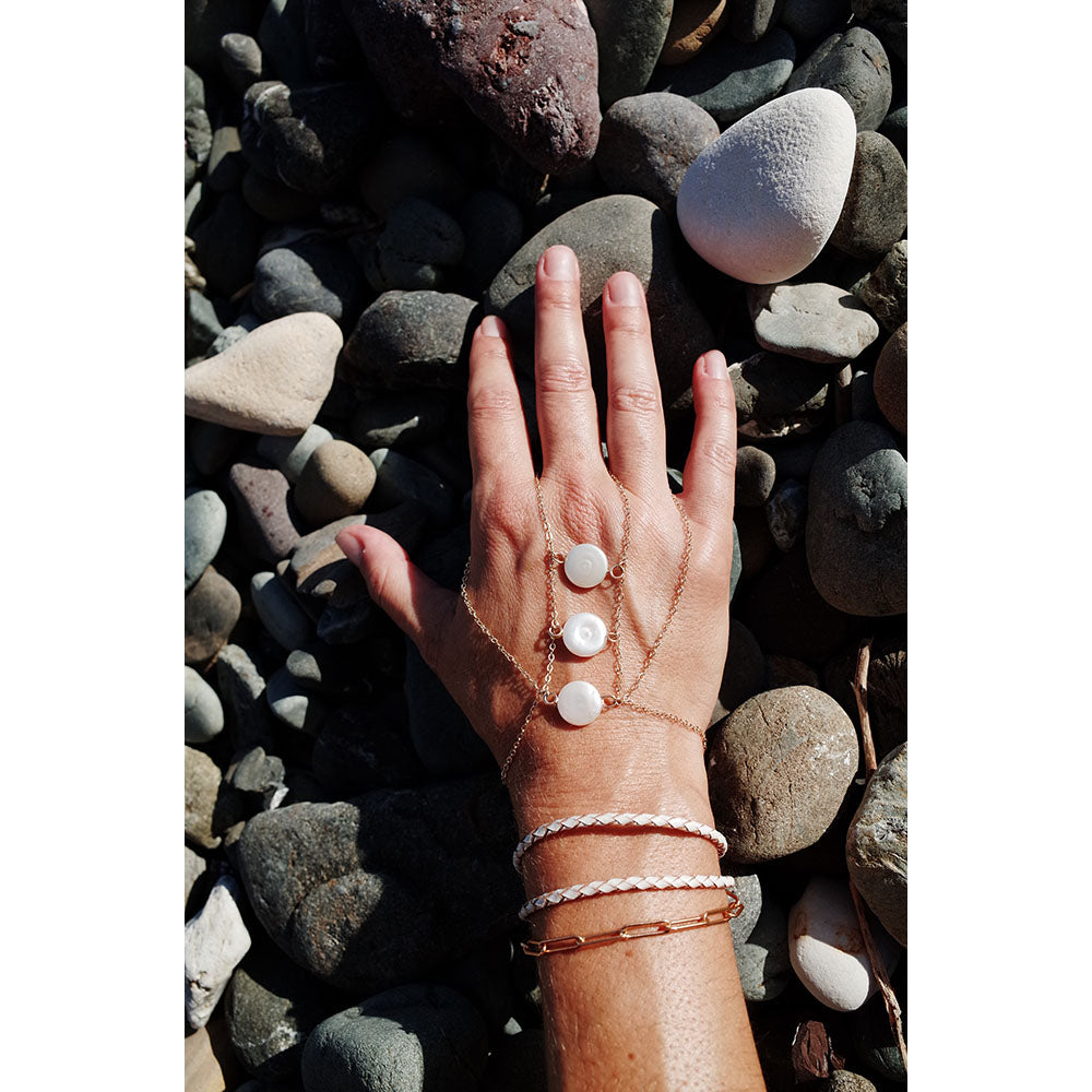 Statement hand chain bracelet.  Made with gold fill and fresh water pearls.