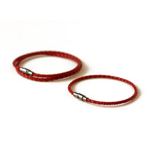 Red leather couple bracelets.  Made from leather and secures with a magnetic closure.  Choose who wears the double wrap and the single wrap.  Chains by Lauren