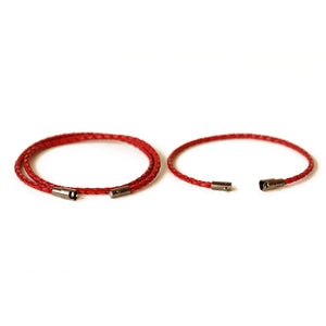 Red leather couple bracelets.  Made from leather and secures with a magnetic closure.  Choose who wears the double wrap and the single wrap.  Chains by Lauren