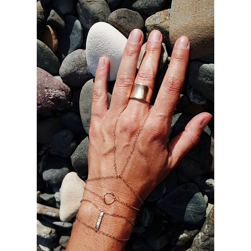 The simple gold handchain.  Worn here with the gold circle bracelet, and gold charm bracelet.  Found on chainsbylauren.us.  Simple, elegant, and durable.  Wear this on the daily.  Handmade.  Chains by Lauren