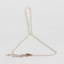 Simple silver handchain bracelet made with sterling silver.  Adjustable so one size fits all.  Handmade.  Chains by Lauren