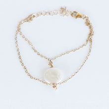 Pearl charm bracelet.  Made with a fresh water pearl and gold fill chain.  Chains by Lauren.