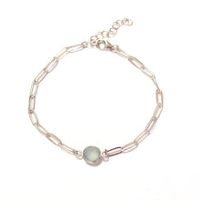 This dainty silver paper clip chain charm bracelet is perfect to wear with your paper clip chain jewelry. Made of sterling silver and a chalcedony stone. Chains by Lauren