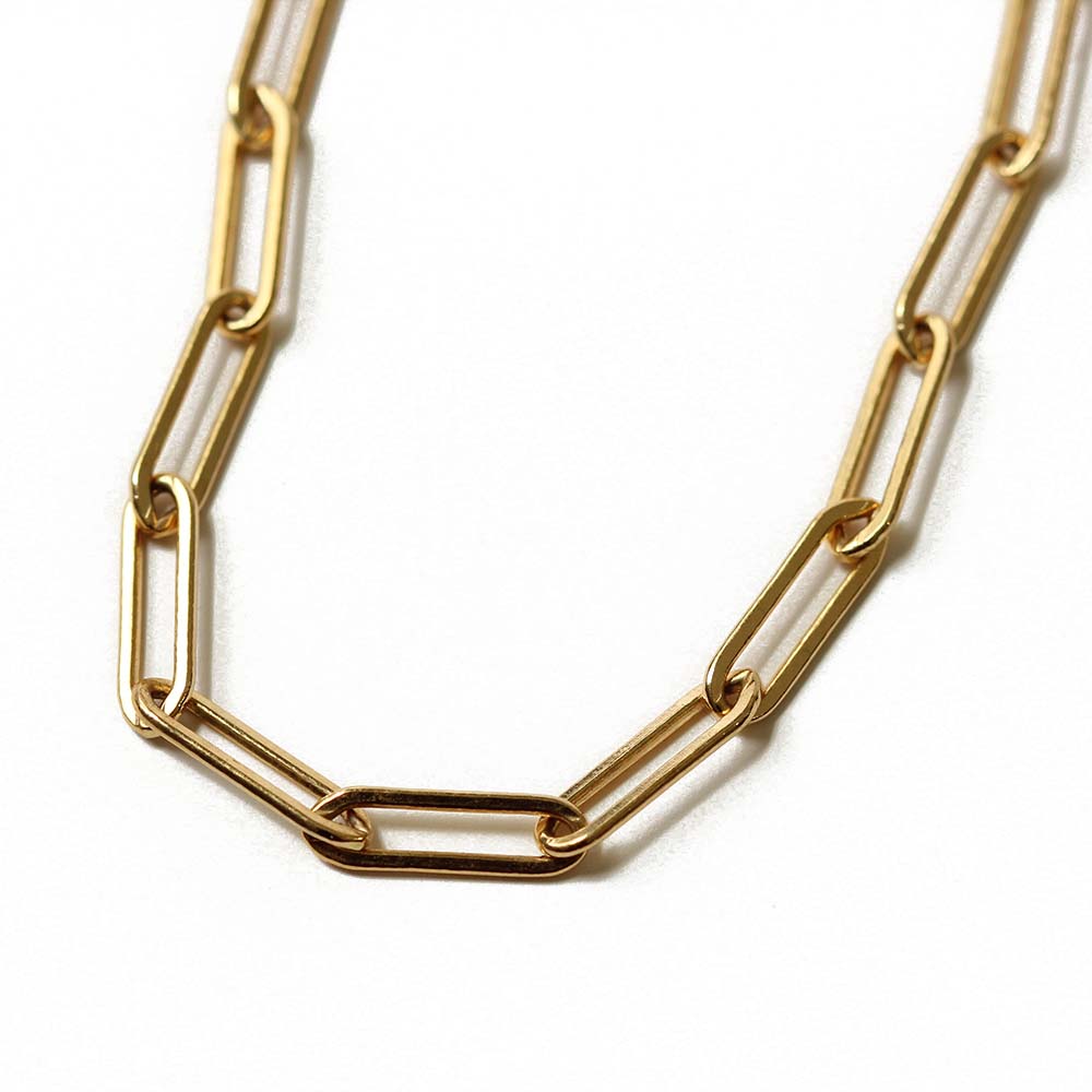 Paper clip chain gold necklace.  Adjust the length with the back extension or secure the lobster close through the paper clip chain links.  Handmade.  Chains by Lauren