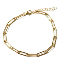 Paper clip gold chain charm bracelet.  Adjustable so one size fits all.  Chains by Lauren