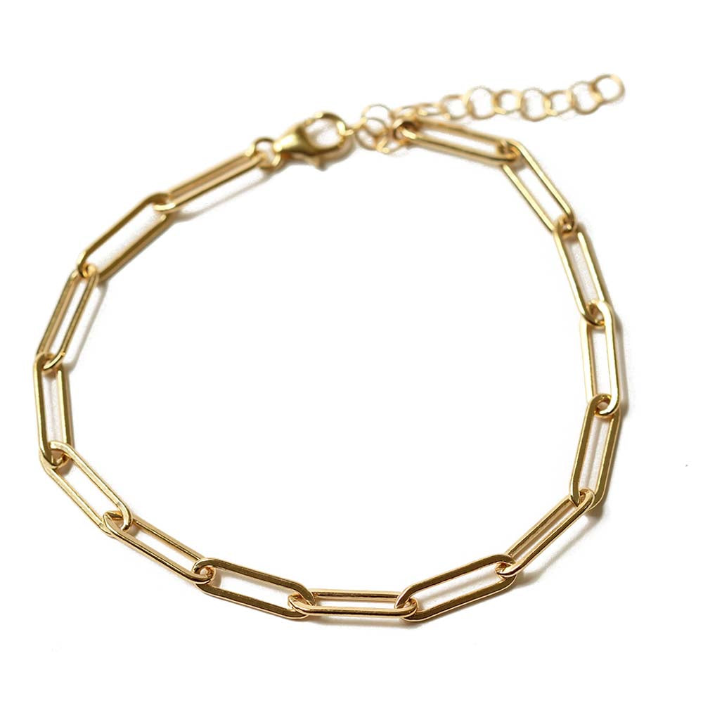 Paper clip gold chain charm bracelet.  Adjustable so one size fits all.  Chains by Lauren