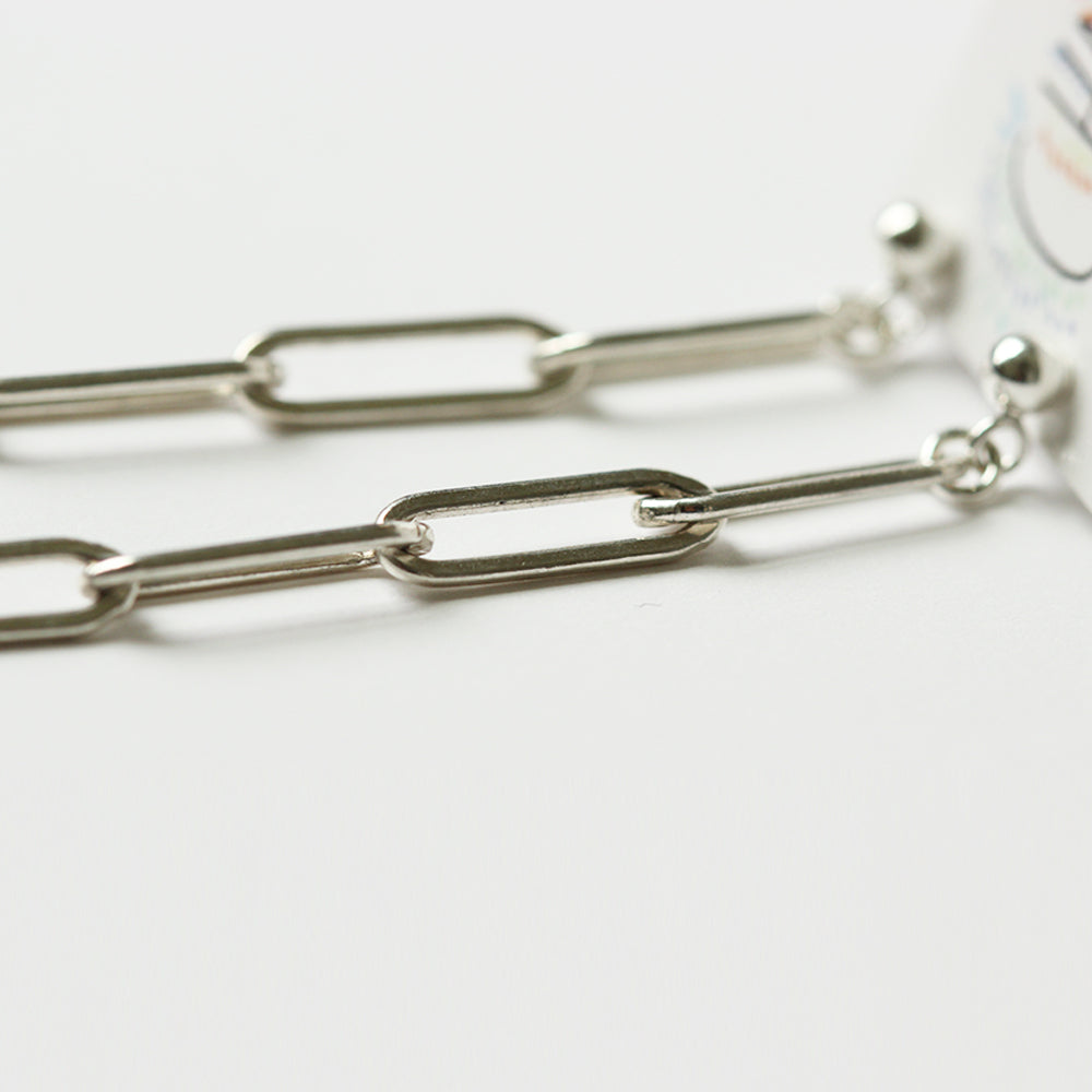 Close up of the silver paper clip chain earrings by Chains by Lauren. Made from sterling silver. Handmade. Chains by Lauren