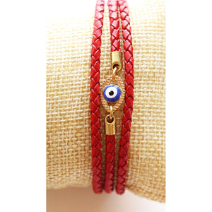 Red wrap evil eye charm bracelet. Made with leather. Adjustable so one size fits all. Handmade. Chains by Lauren  Edit alt text