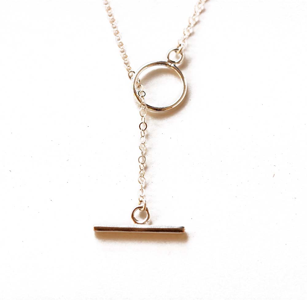 Close up of the toggle on the silver lariat.  Handmade.  Chains by Lauren