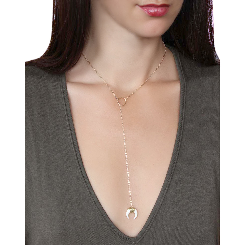 White horn lariat.  Made of gold fill and bone.  Also, available in black.  Handmade.  Chains by Lauren