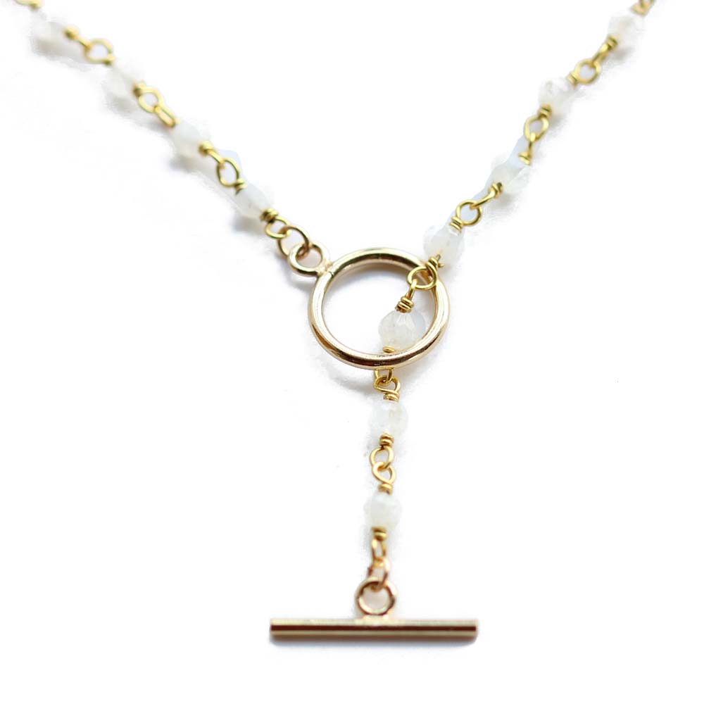 Close up of the white beaded moonstone lariat by Chains by Lauren.  www.chainsbylauren.us.  Handmade.  Chains by Lauren