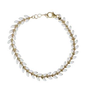 White and gold wheat bracelet.  Wear alone or stack.  Adjustable so one size fits all.   Chains by Lauren