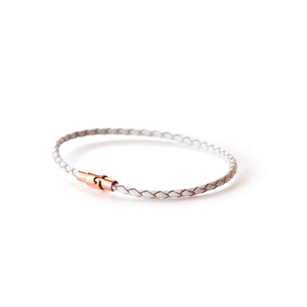 Women's thin white leather bracelet with a rose gold magnetic closure.  Available in a range of sizes.  Handmade!