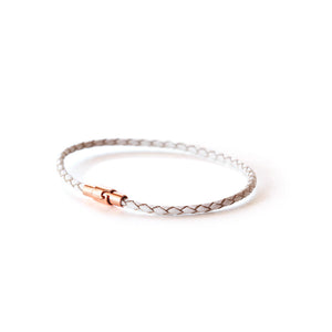 Women's thin white leather bracelet with a rose gold magnetic closure.  Available in a range of sizes.  Handmade!