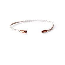 Women's thin white leather bracelet with a rose gold magnetic closure.  Available in XS-L.  Check out how to choose the correct size online.