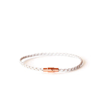 Women's thin white leather bracelet with a rose gold magnetic closure.  Available in a range of sizes.